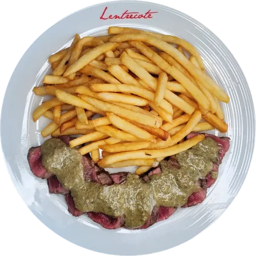 Le Steak at Lentrecote: sliced sous-vide USDA top sirloin with the famous herb-butter sauce and fries, on a Lentrecote plate