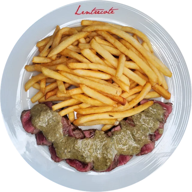 Le Steak at Lentrecote: sliced sous-vide USDA top sirloin with the famous herb-butter sauce and fries, on a Lentrecote plate