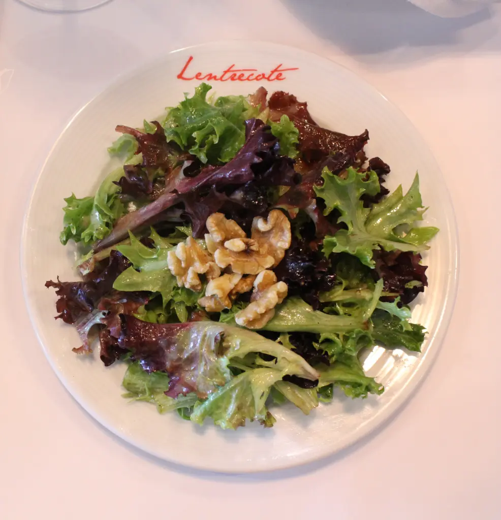 La Salade — fresh greens with toasted walnuts and Dijon vinaigrette
